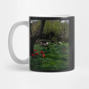 Tropical Bright pink and white birds at safari west with dark green foliage Mug